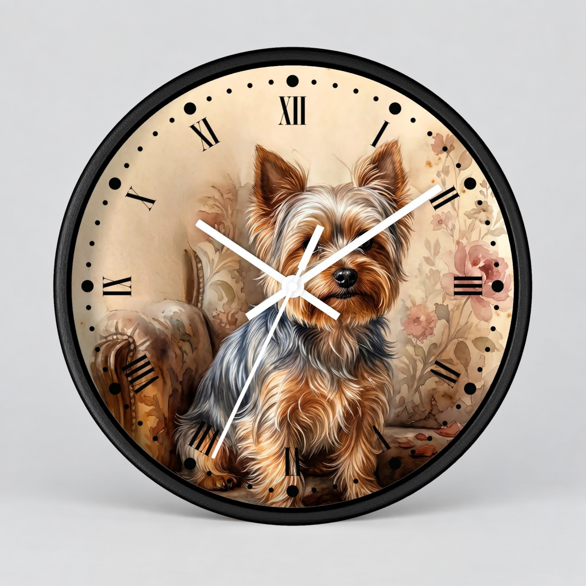 Round wall clock with a black frame and a printed illustration of a Yorkshire Terrier on the face, with Roman numerals and white clock hands, shown on a light gray background.