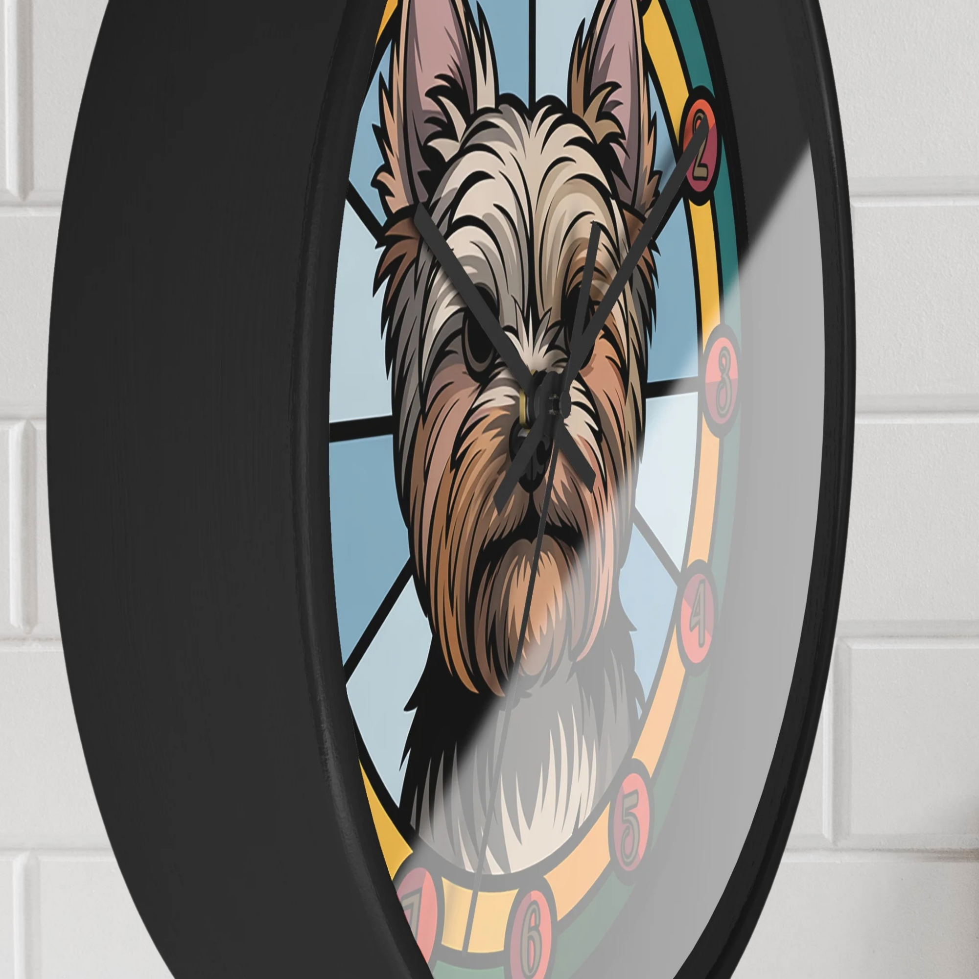 Wall clock with a Yorkie dog illustration in a stained glass style on a white brick wall background.