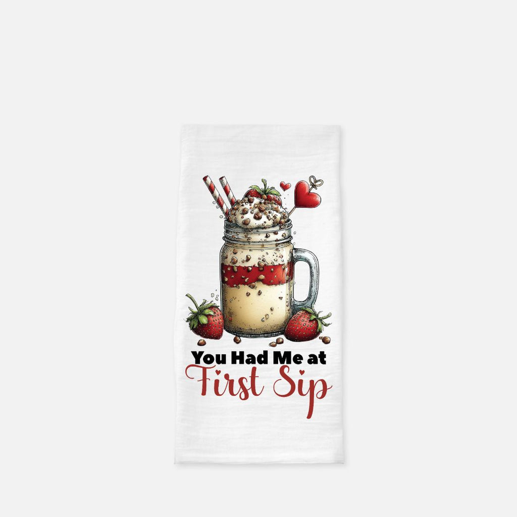 Towel with a mason jar graphic and text 'You Had Me at First Sip' on a white background
