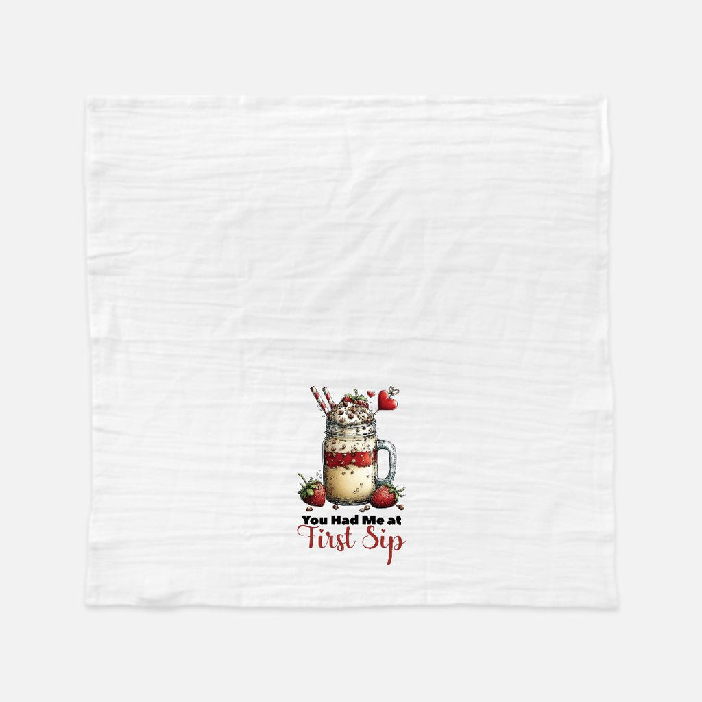 Tea towel with a milkshake graphic and text 'You Had Me At First Sip' on a white background