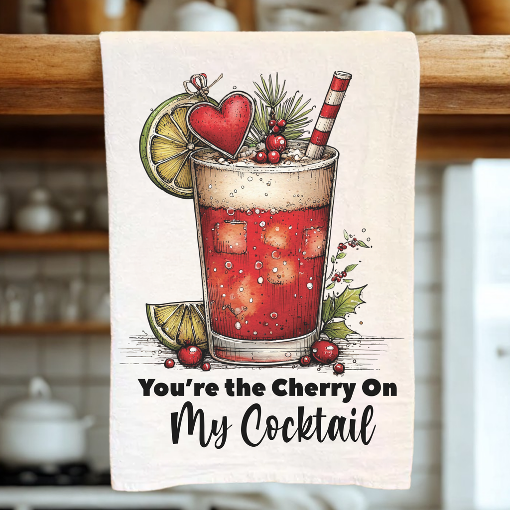 Tea towel with a cocktail illustration and text in a kitchen setting