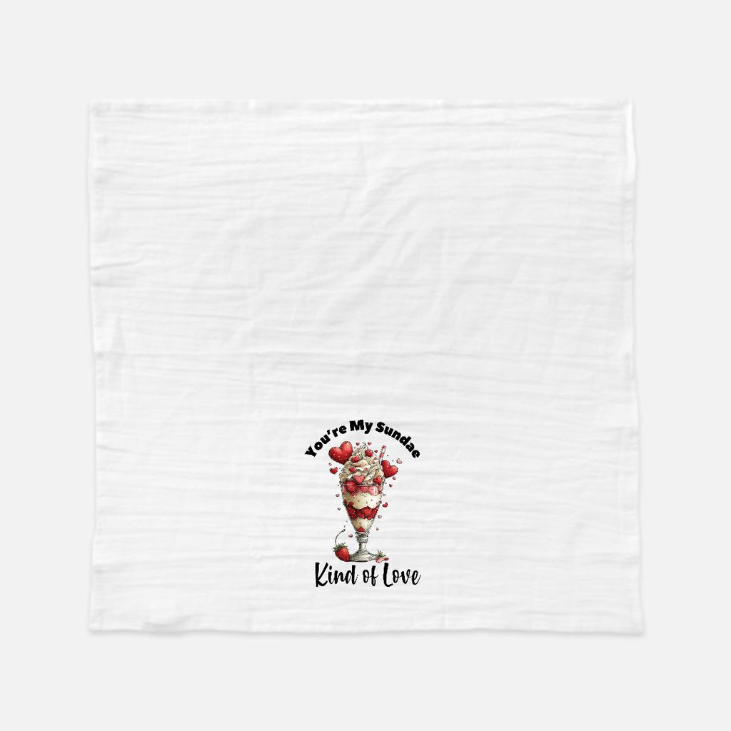 White tea towel with a graphic of a sundae and text on a white background
