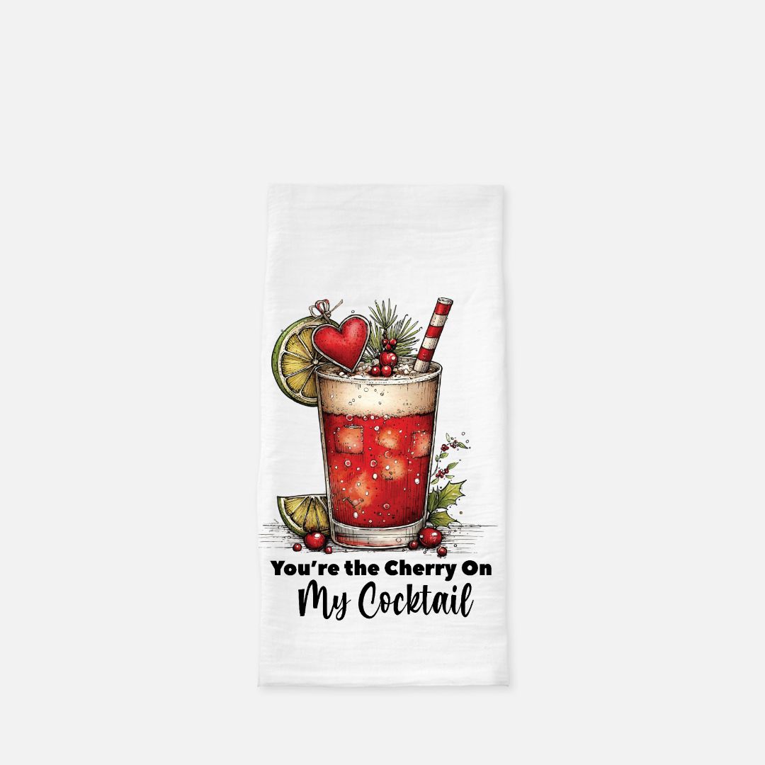 Tea towel with a cocktail design and text ' You're the Cherry On My Cocktail'
on a white background