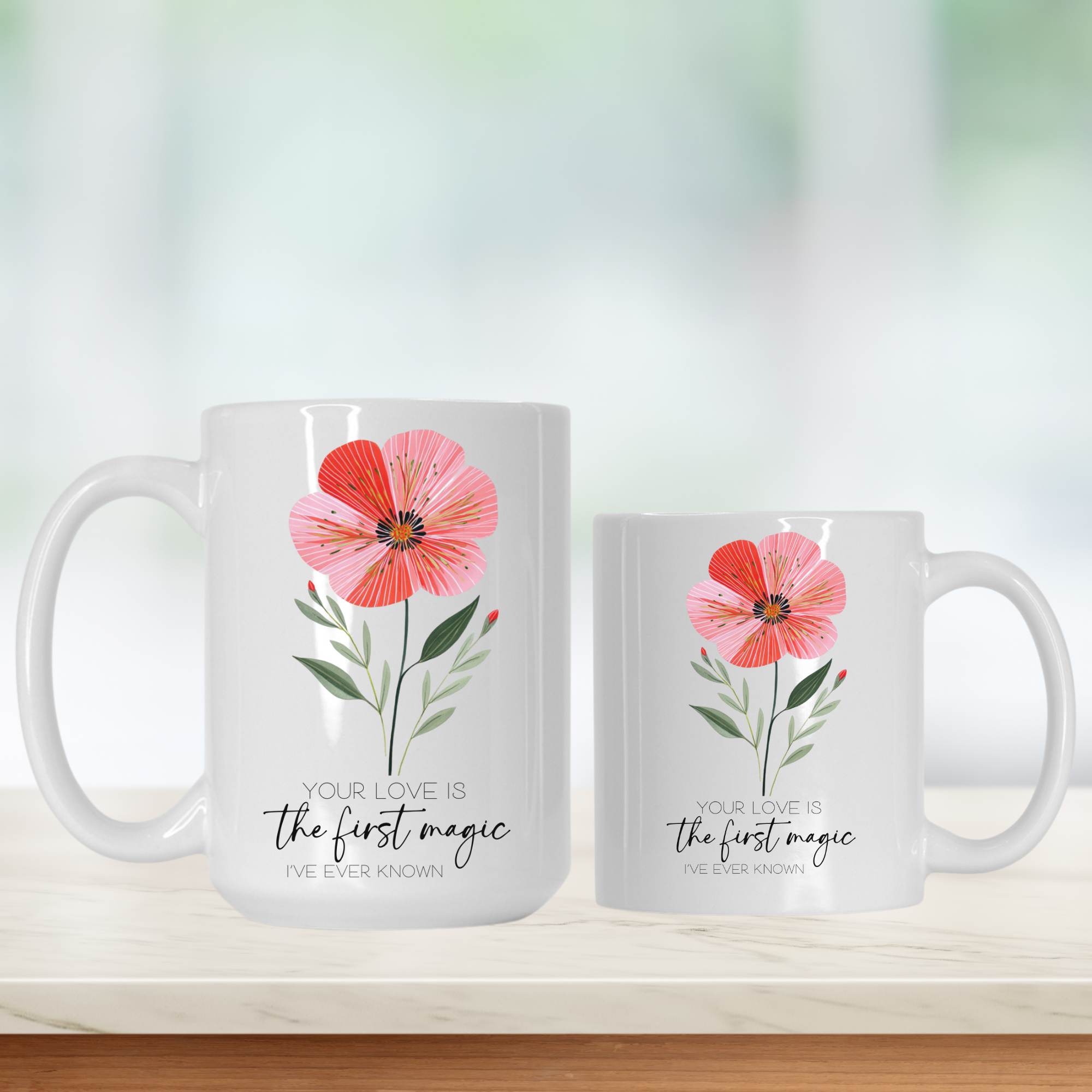 15oz & 11oz mugs with floral design and text 'Your Love Is the first magic I've Ever Known' on a white background