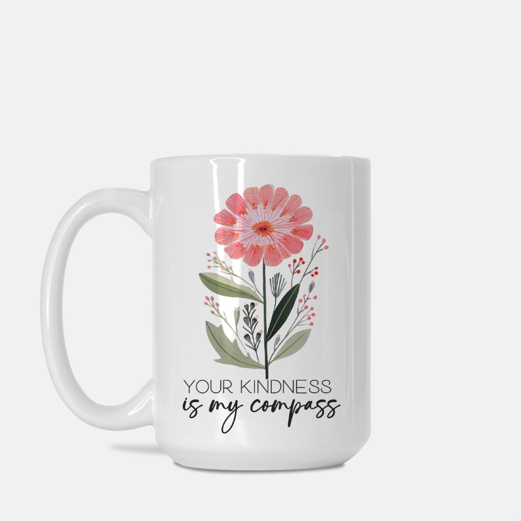 15oz white mug with floral design and text 'Your kindness is my compass' on a white background
