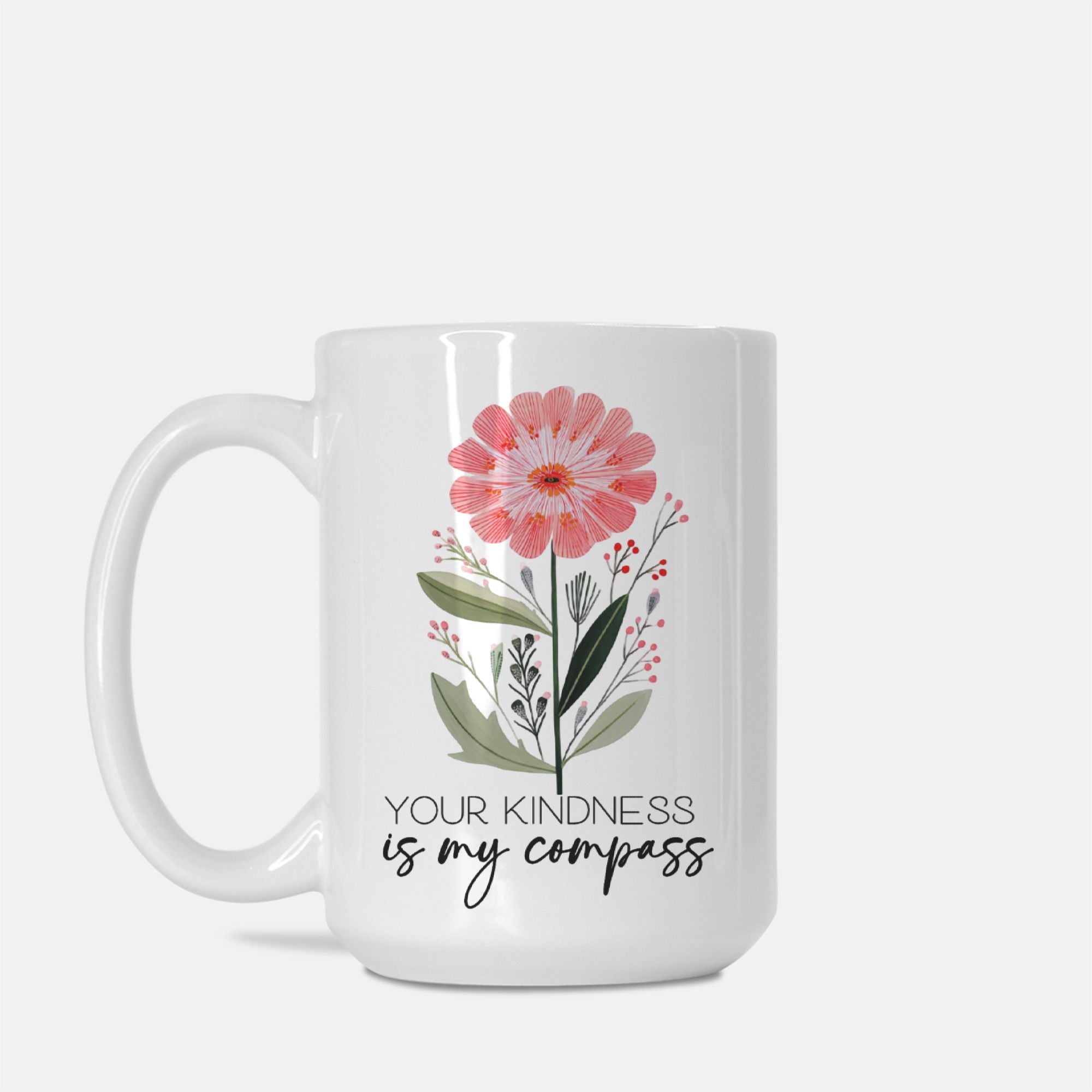 15oz white mug with floral design and text 'Your kindness is my compass' on a white background