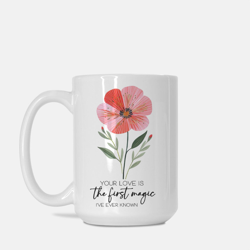 White mug with a floral design and text on a white background