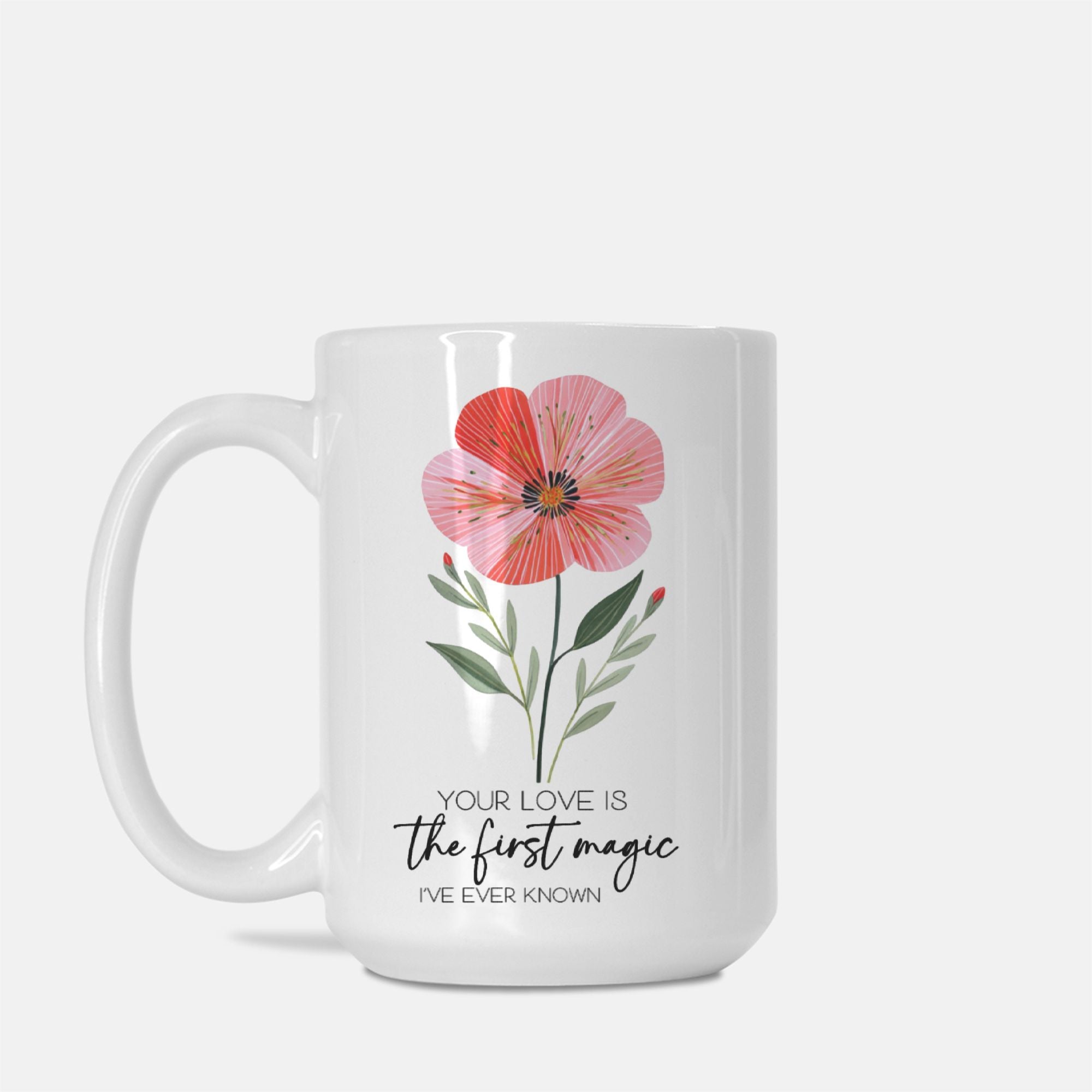 White mug with a floral design and text on a white background