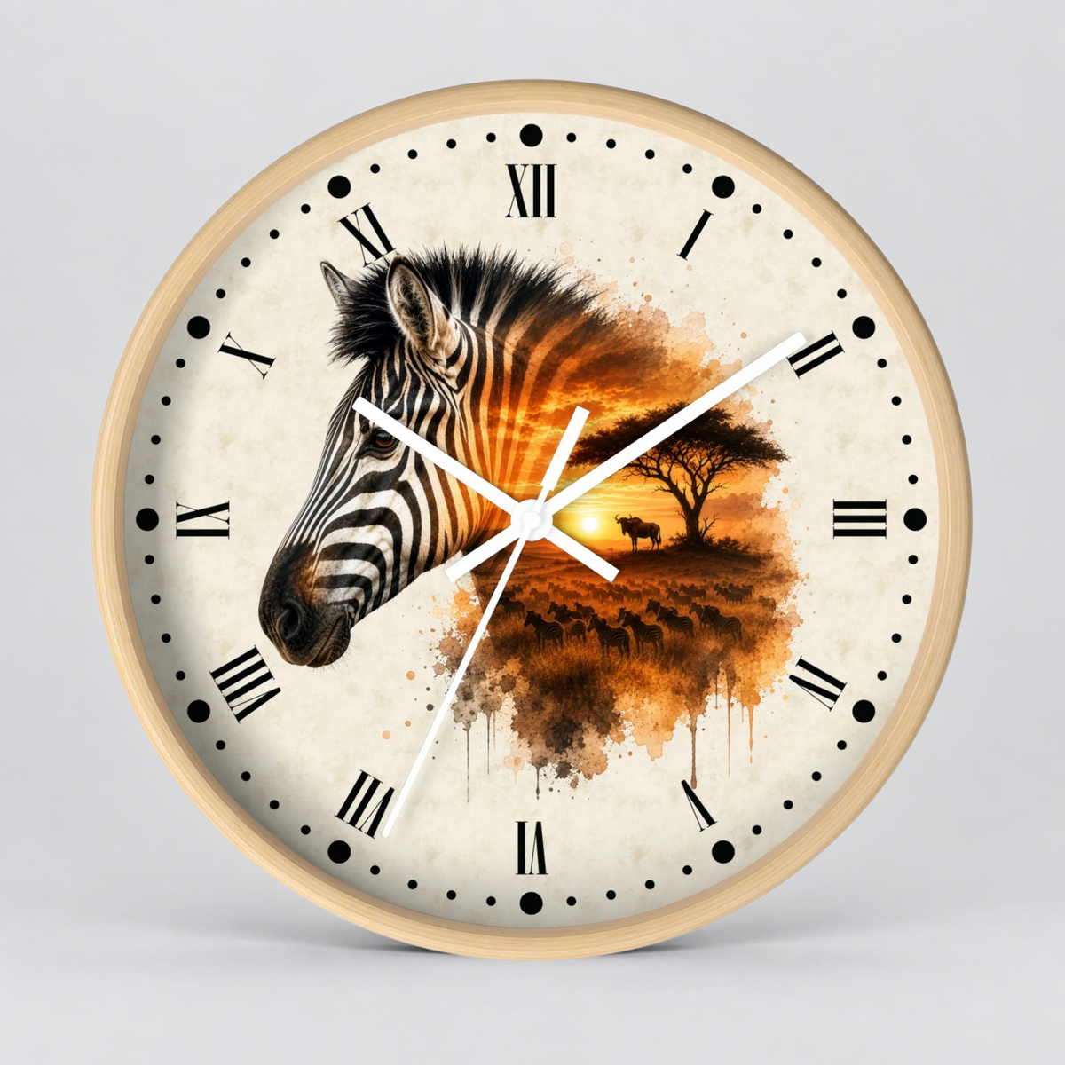 Round wall clock with a light wood frame, featuring a zebra head on the left and an orange sunset landscape with a tree on the right, over an off-white background with black Roman numerals and white clock hands.