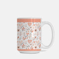 Mug with floral and heart pattern on a white background