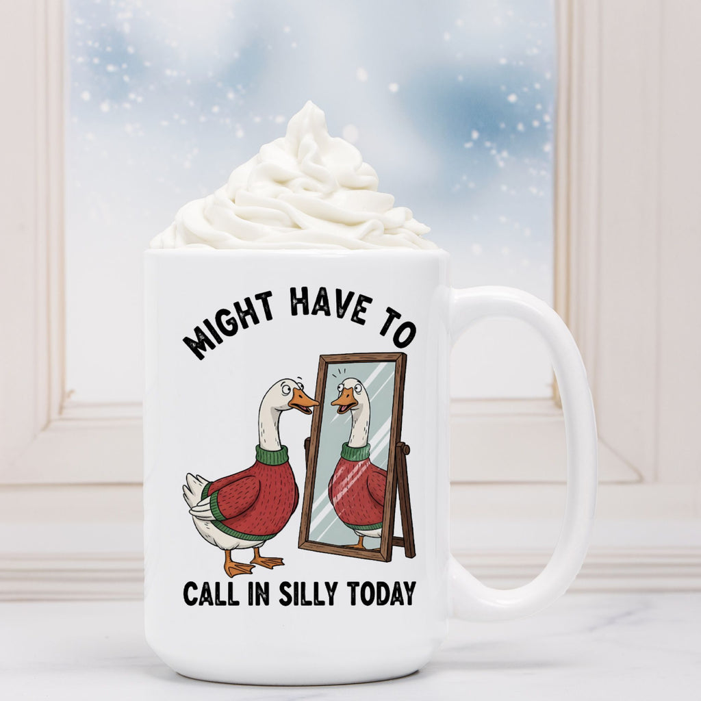 White mug with a cartoon goose and text 'Might have to call in silly today' against a snowy window background.