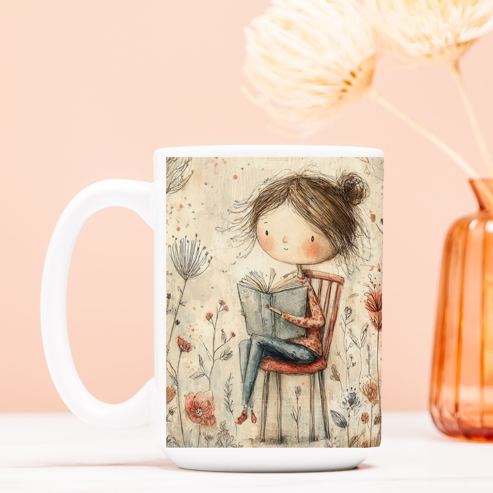 Mug with a design of a girl reading a book surrounded by flowers on a pink background