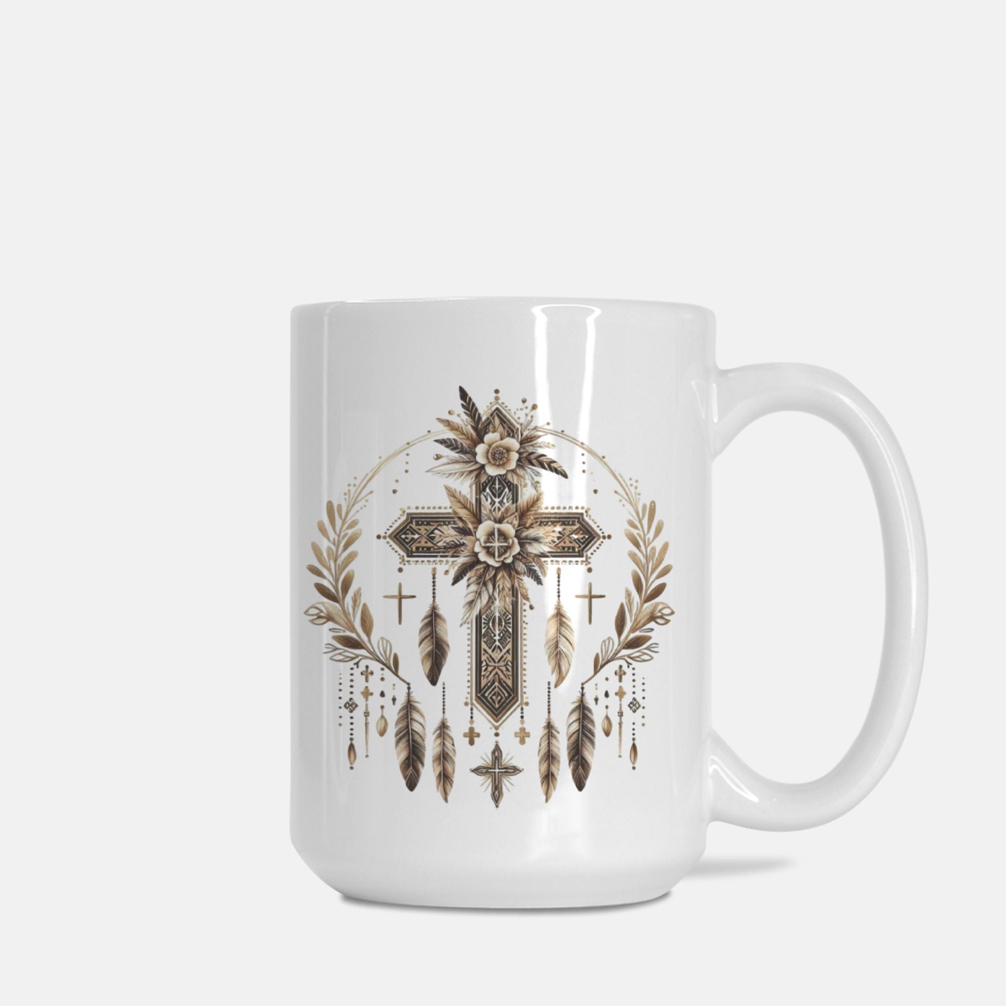 White mug with a decorative cross and feather design on a white background