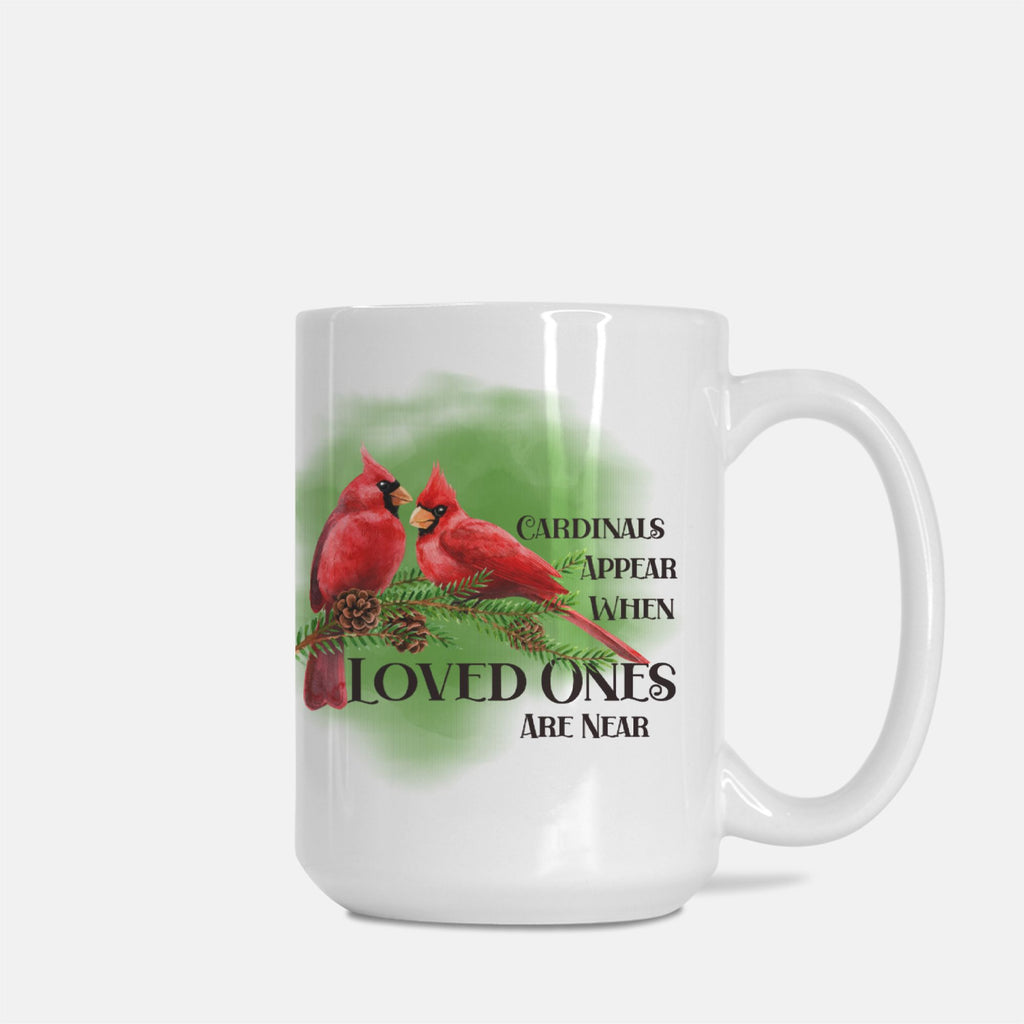 Mug with red cardinals and text on a white background