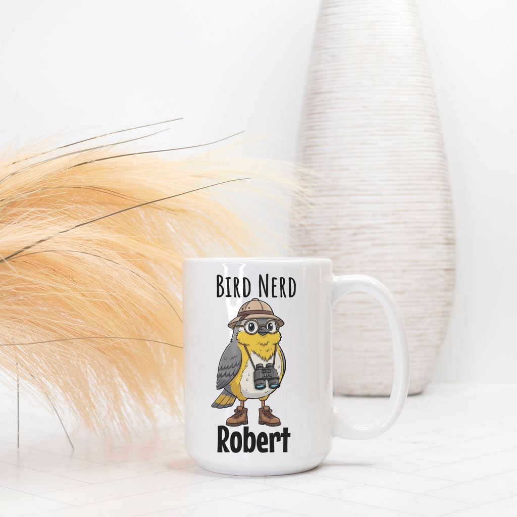 Mug with bird-themed design and text 'Bird Nerd Robert' on a white surface.