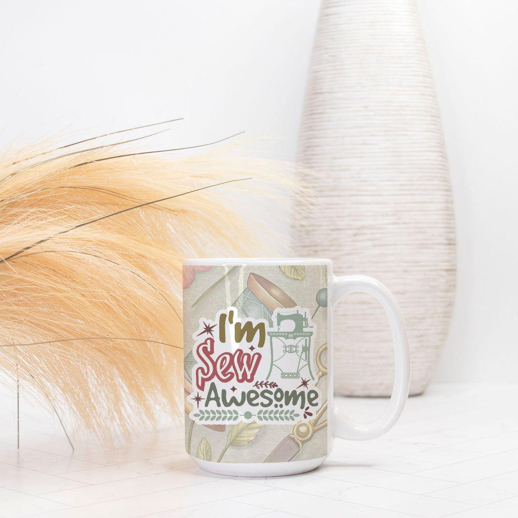 Mug with 'I'm Sew Awesome' text and sewing-themed design on a white surface.