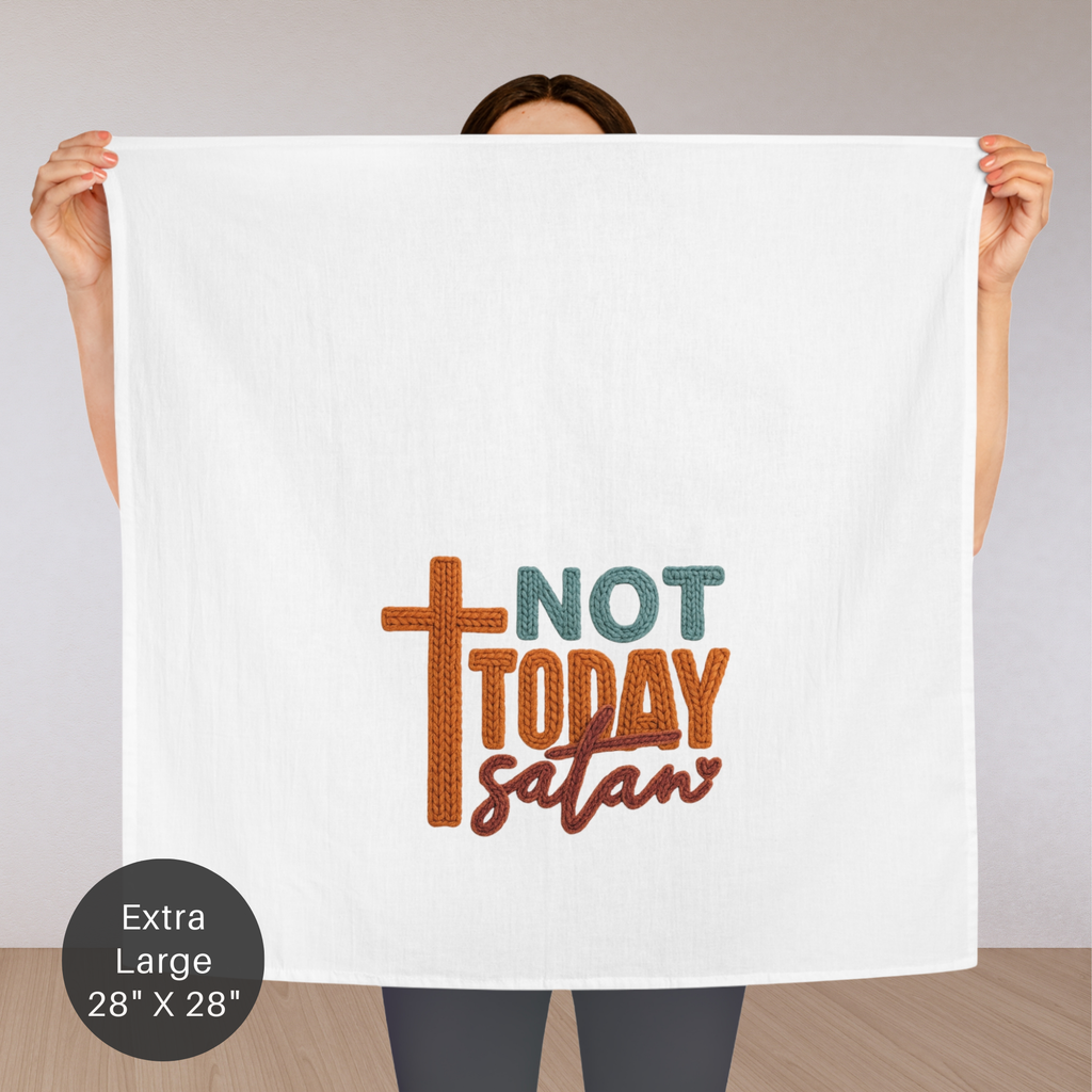 Person holding an extra large tea towel with 'Not Today Satan' text and cross graphic.