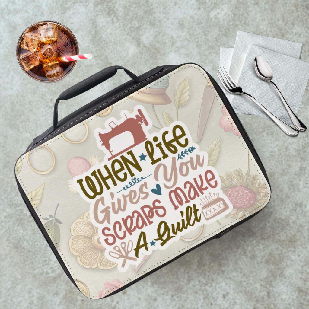 Lunch bag with sewing-themed design and text on a cafeteria table with a drink and utensils.
